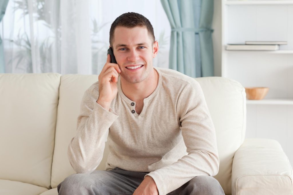 customer service smiling taking phone call